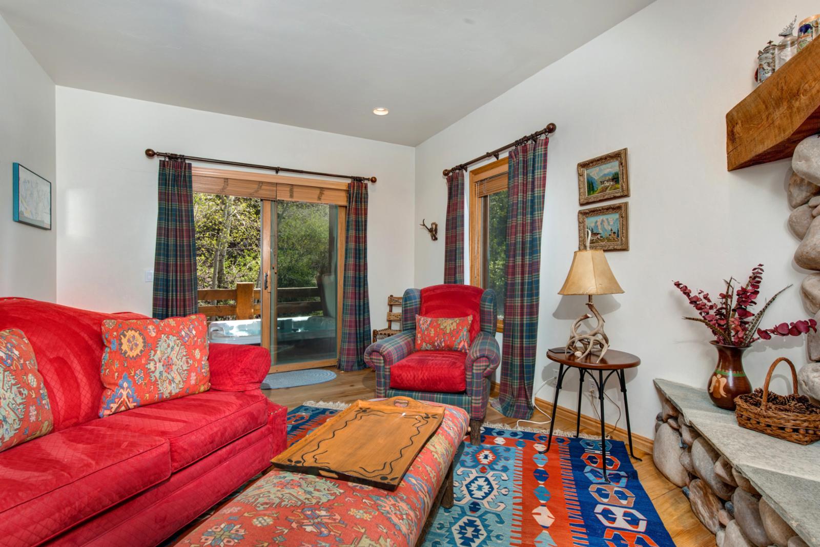 Second family room includes seating, TV, and access to Guest Bedrooms 4 and 5.
