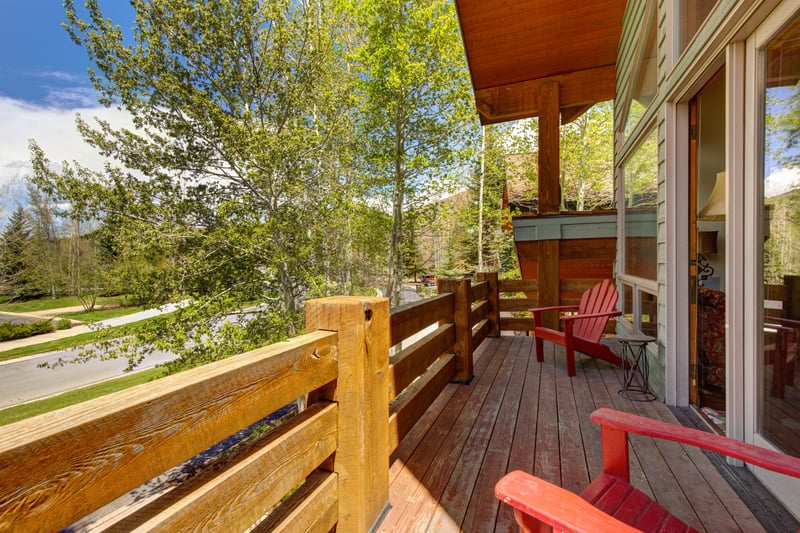 Enjoy morning coffee or evening drinks on your private deck surrounded by trees.