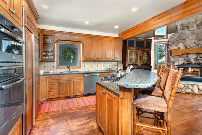 Fully equipped kitchen with double ovens, gas range, and plenty of prep space for group meals.