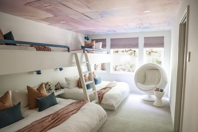 Roomy bunk room with two Twin-over-King beds and lounge area for relaxed hangouts.