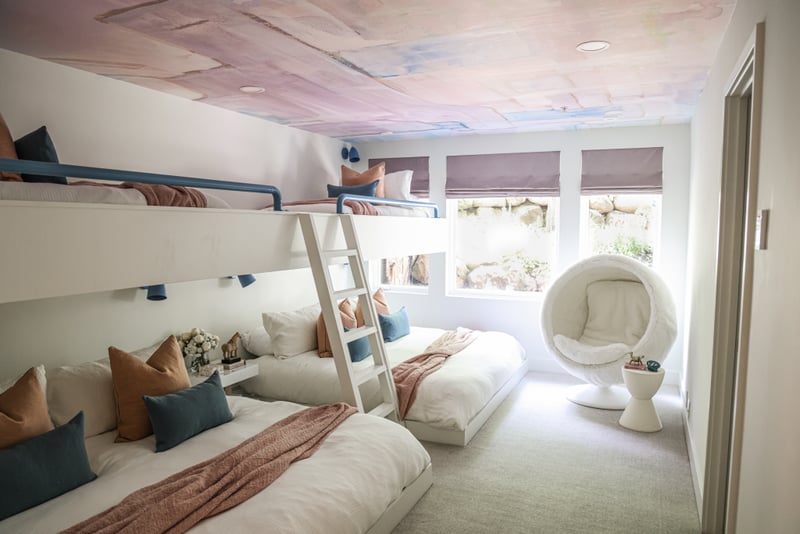 Roomy bunk room with two Twin-over-King beds and lounge area for relaxed hangouts.