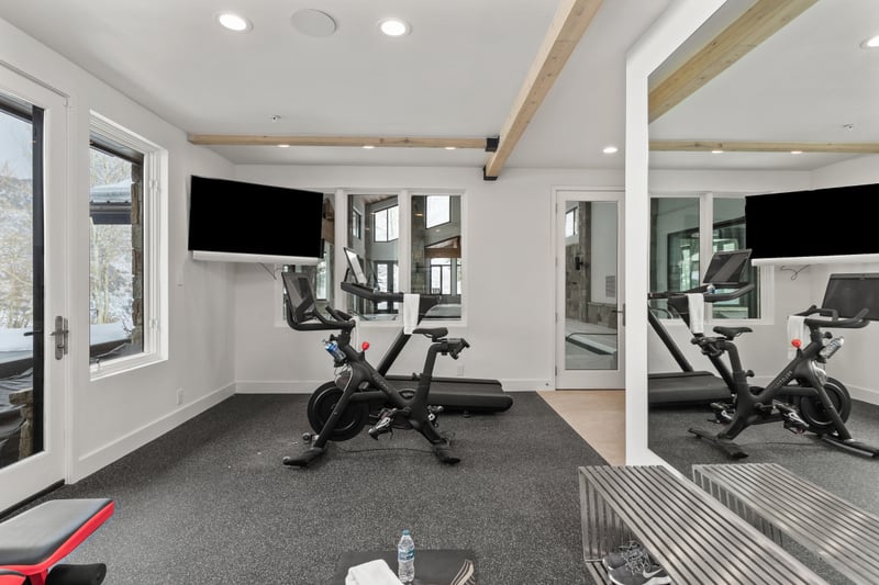 Work out without leaving home—your private gym is stocked with weights, mirrors, and equipment.
