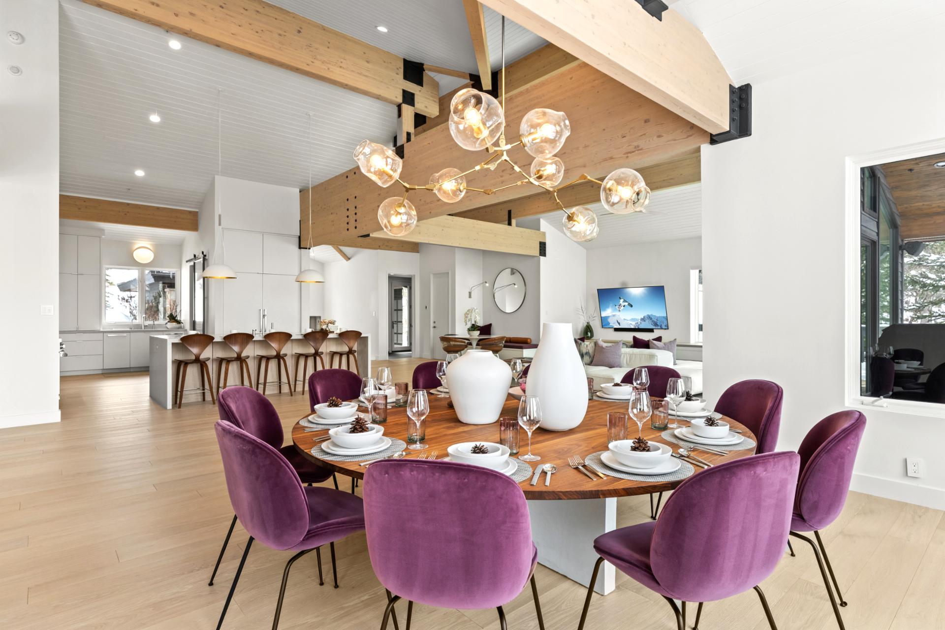 Chic and spacious, this dining area connects to the kitchen and opens to main-level living.