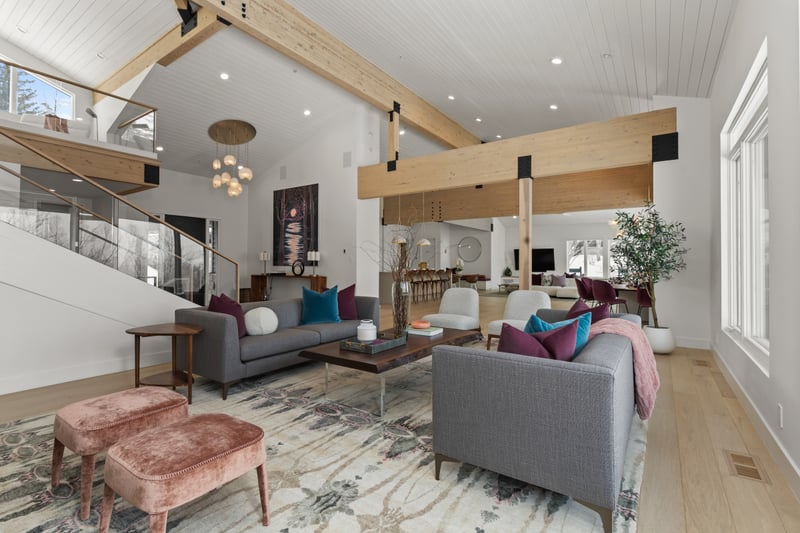 Vaulted ceilings and warm tones bring cozy elegance to this spacious main living room.