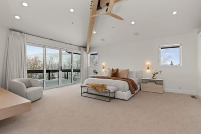 Your spacious primary suite includes a King bed, lounge area, and ensuite spa bath.