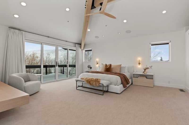 Your spacious primary suite includes a King bed, lounge area, and ensuite spa bath.