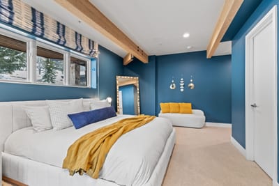 Alternate angle with lounge chair and ensuite bath access.
