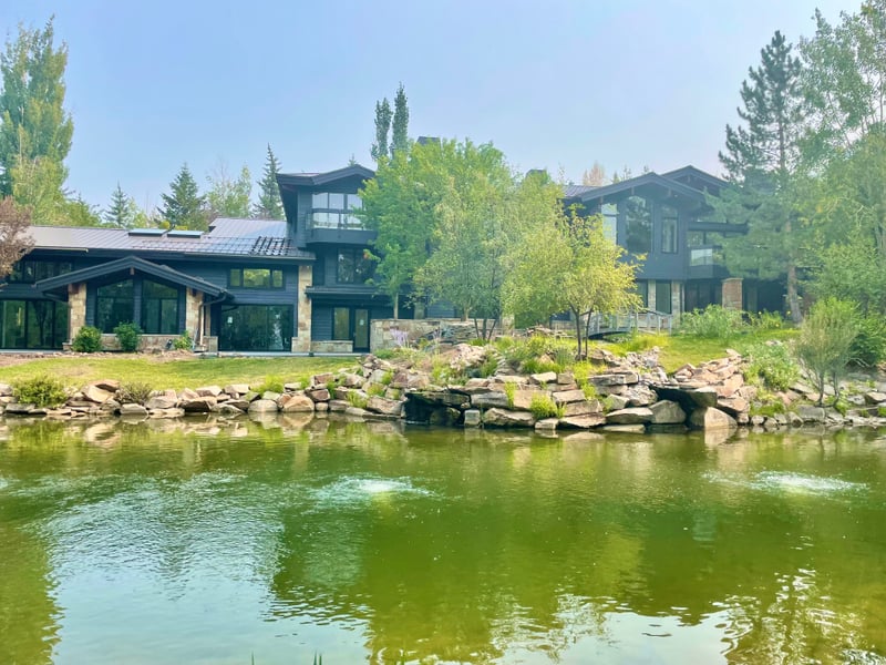 Pond, lawn, and gardens provide a tranquil escape just outside your door.