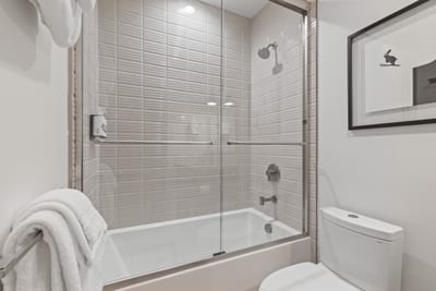 Full tub and shower combo makes this bath ideal for guests or little ones.