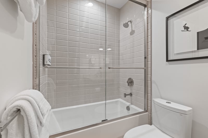 Full tub and shower combo makes this bath ideal for guests or little ones.