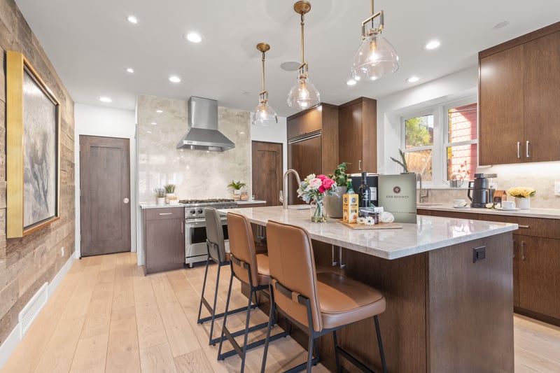Sleek design and premium appliances make this modern kitchen perfect for prepping family meals or après-ski spreads. PEA-1009