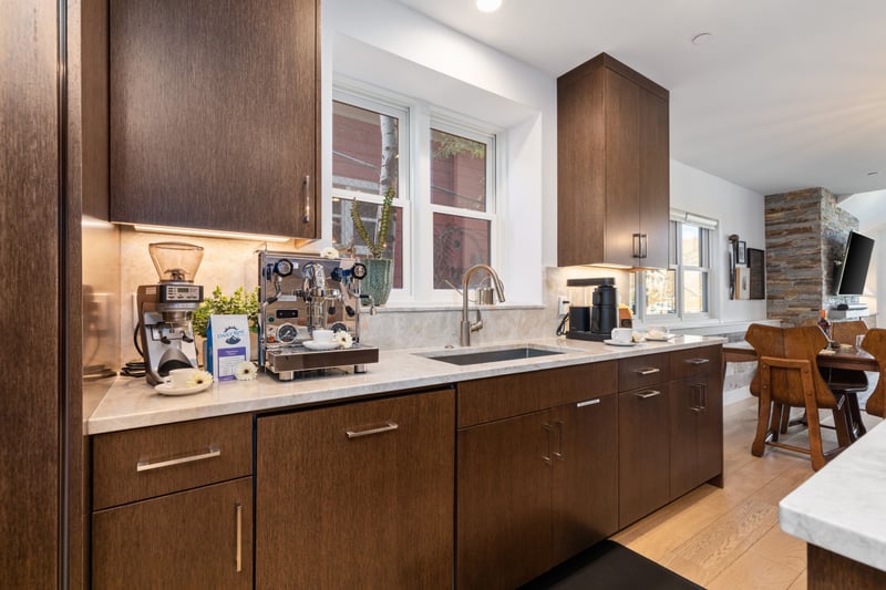 Ample storage and streamlined cabinetry make this kitchen as functional as it is beautiful. PEA-1009