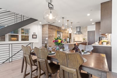 The dining area offers a warm setting for dinner parties or casual breakfasts with family. PEA-1009