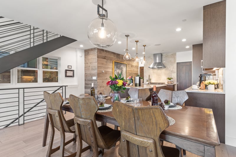 The dining area offers a warm setting for dinner parties or casual breakfasts with family. PEA-1009