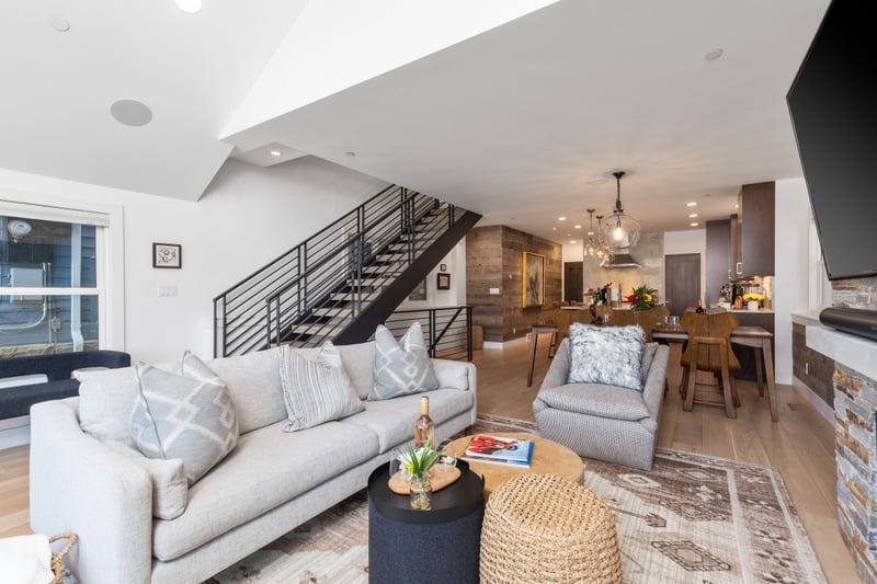 View highlights spacious seating, stylish accents, and open layout across levels. PEA-1009