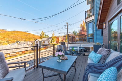 Take in mountain and village views from your elevated perch just outside the main living area. PEA-1009