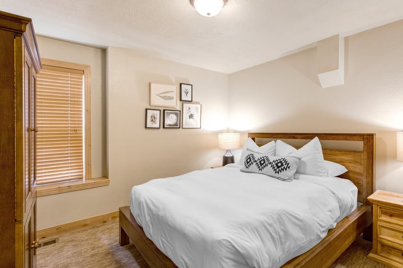Sleep soundly in this main-level guest room with a Queen bed, wood furnishings, and closet space.
