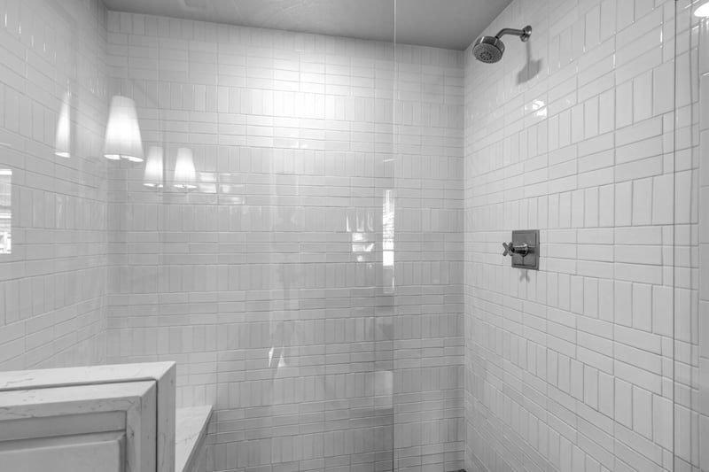 Walk-in shower with tile surround, perfect for a relaxing rinse after a day out.