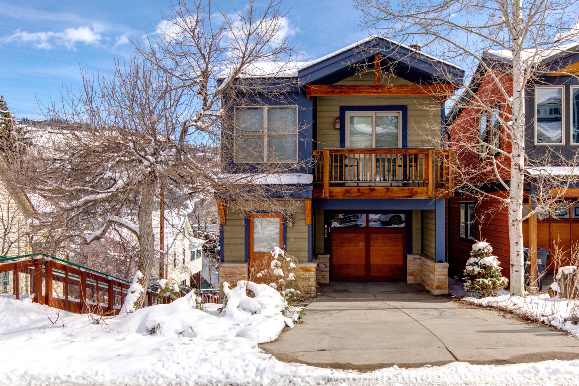 Your snow-covered front steps lead into a warm, spacious retreat ready for winter adventure.