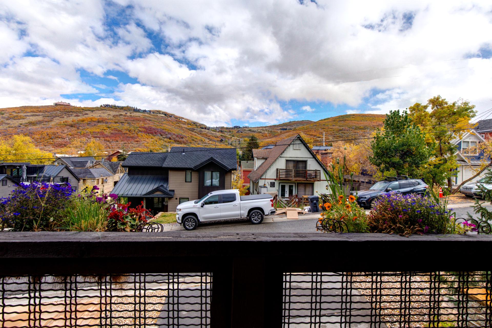Look out across colorful rooftops and surrounding peaks from your elevated balcony.