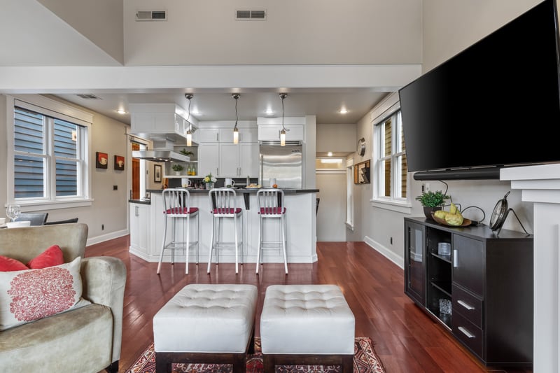 Clean lines, granite counters, and stainless steel elevate this fully equipped kitchen.
