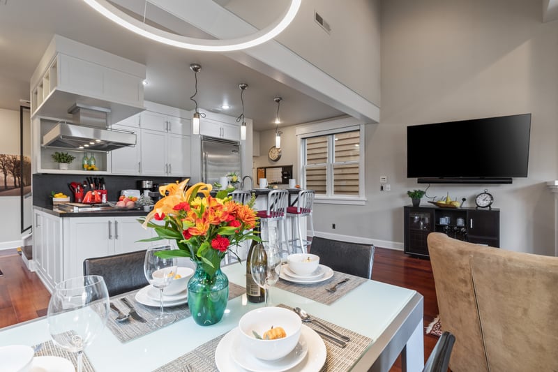 Gather at your dining table with seating for six and stylish lighting for memorable meals.