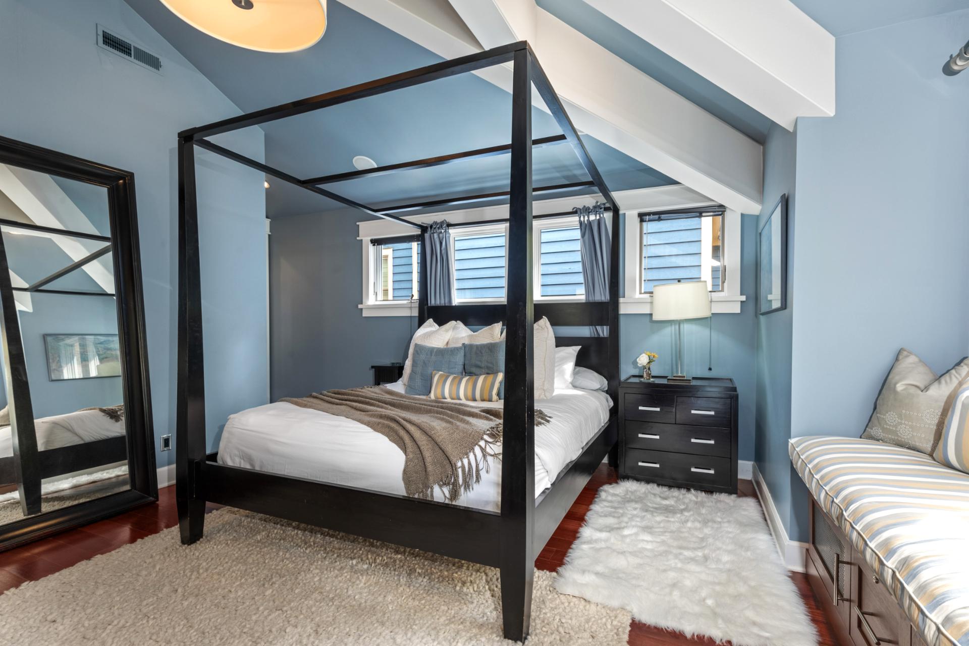 Another angle reveals a reading bench and designer finishes in your primary retreat.