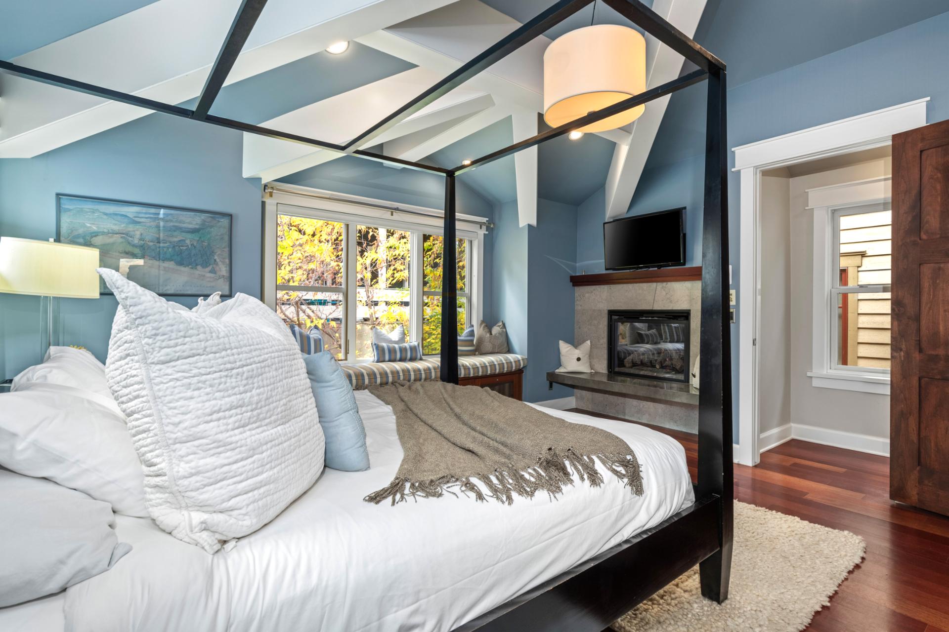 Relax in this serene space with plush bedding and easy access to your private bath.