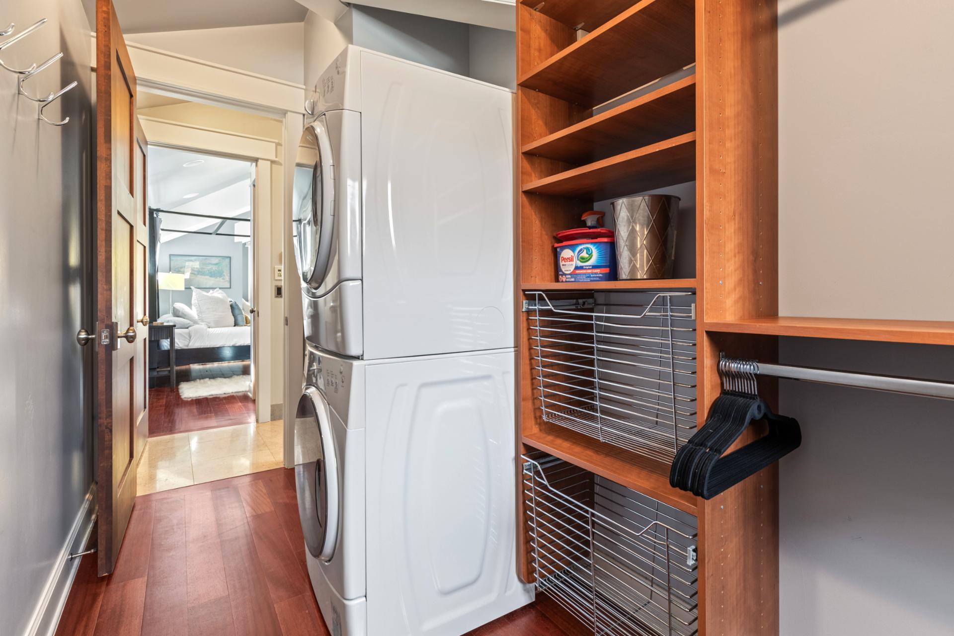 Additional view of your second laundry zone with extra storage for gear and supplies.