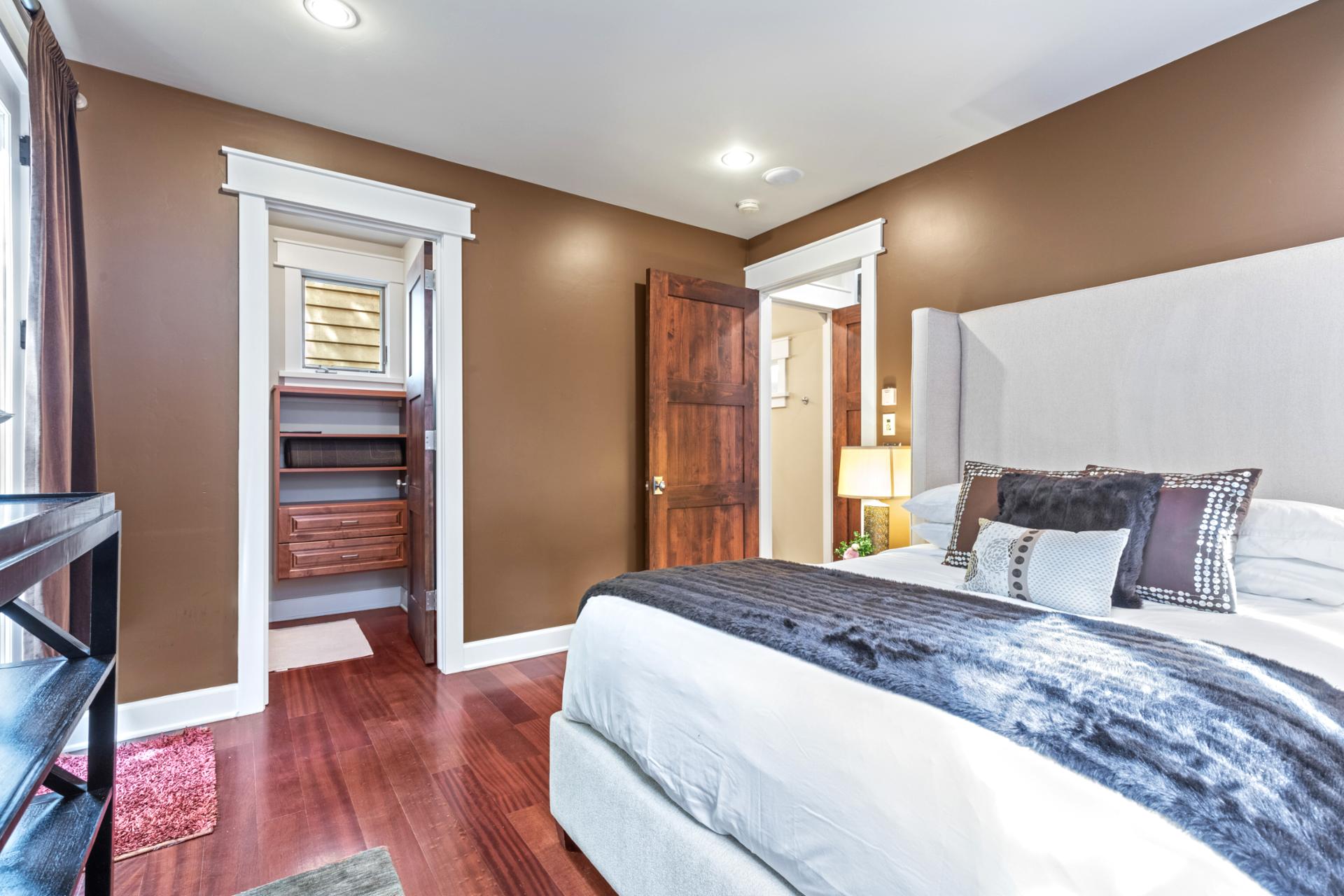 A second view reveals closet space and elegant furnishings.