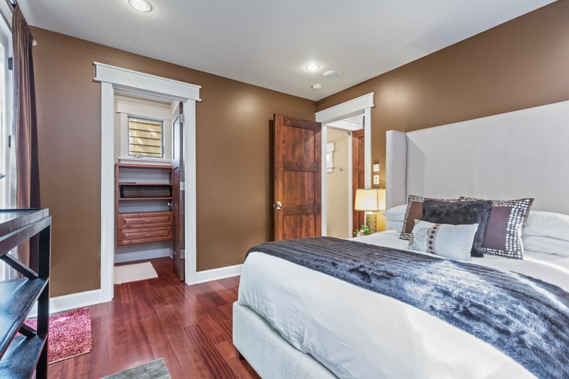 A second view reveals closet space and elegant furnishings.