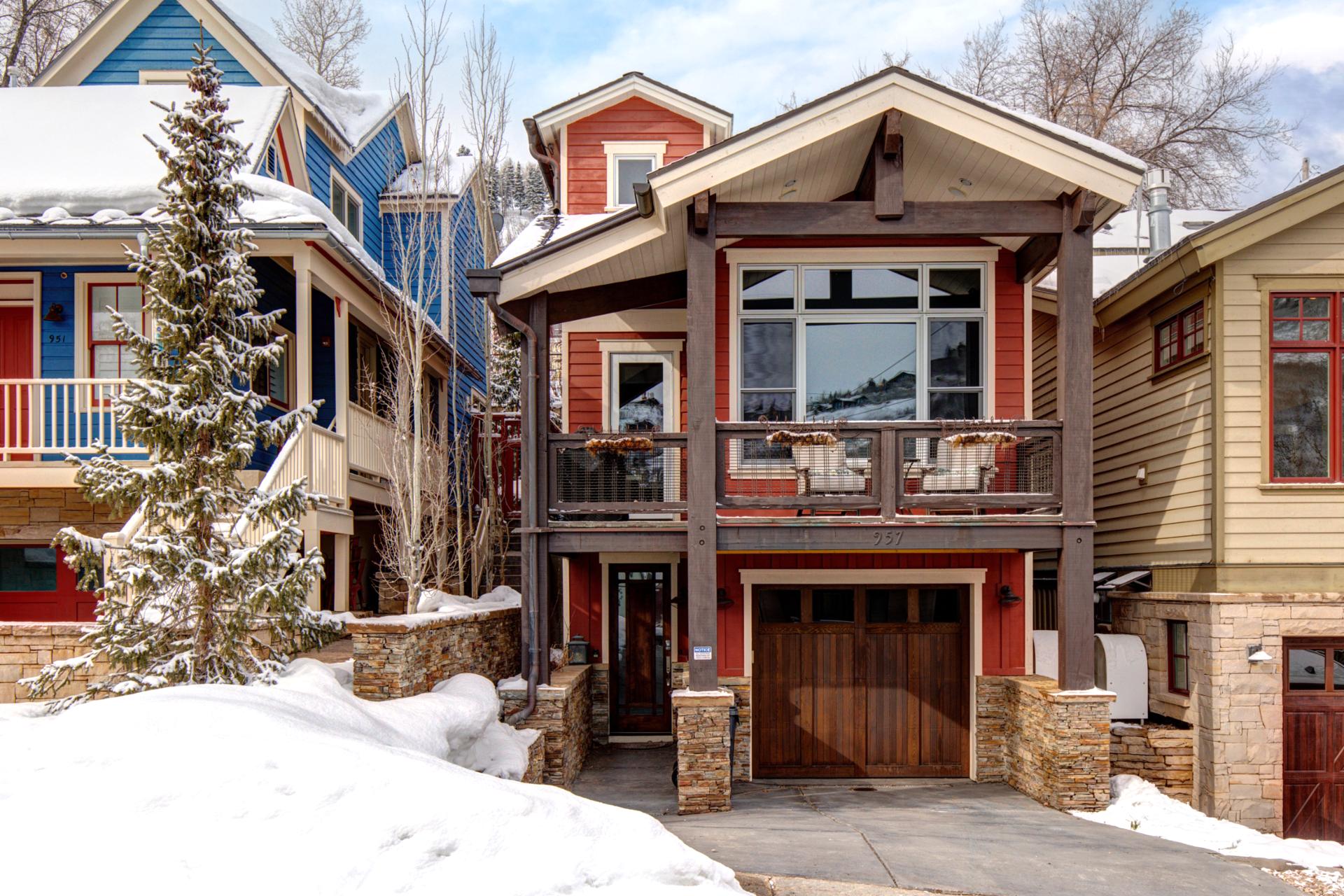 The home's alpine architecture and warm finishes create a welcoming mountain retreat year-round.