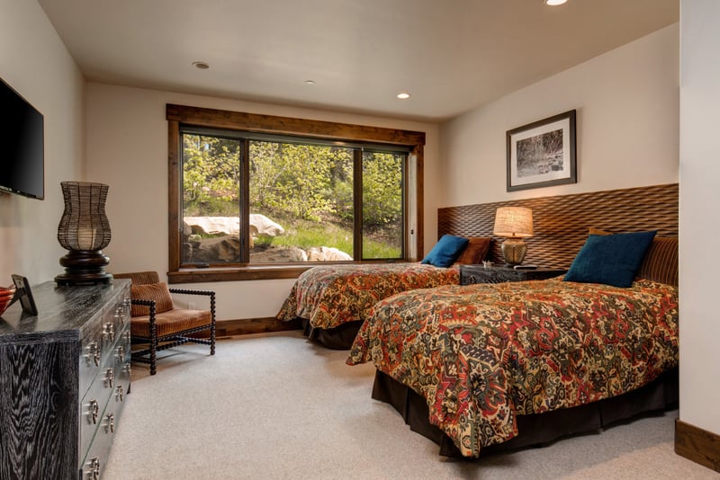 Offers cozy twin beds and mountain views through large picture windows.
