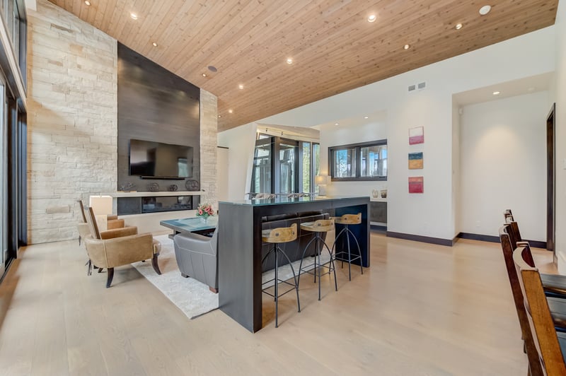 Open area connects seamlessly to kitchen and living for casual meals or gathering conversations.