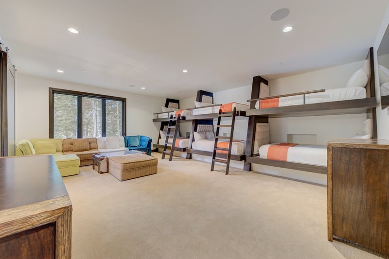Bunk room with three built-in Queen-over-Queen beds comfortably sleeps up to 12.
