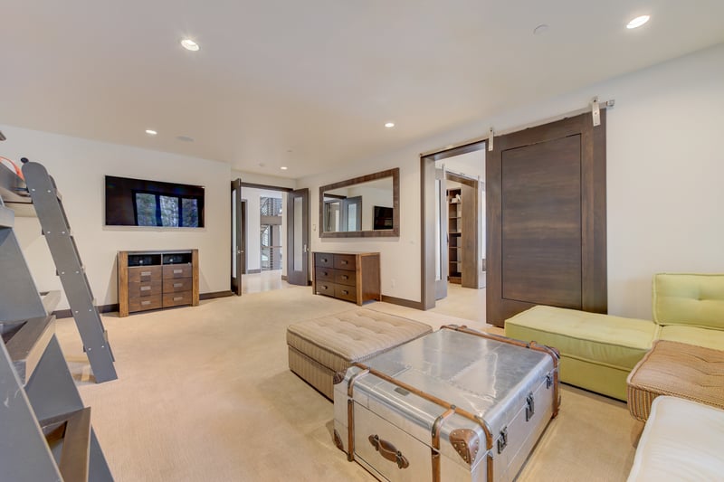 This oversized room includes lounge space, bunk beds, and TV for the whole group.