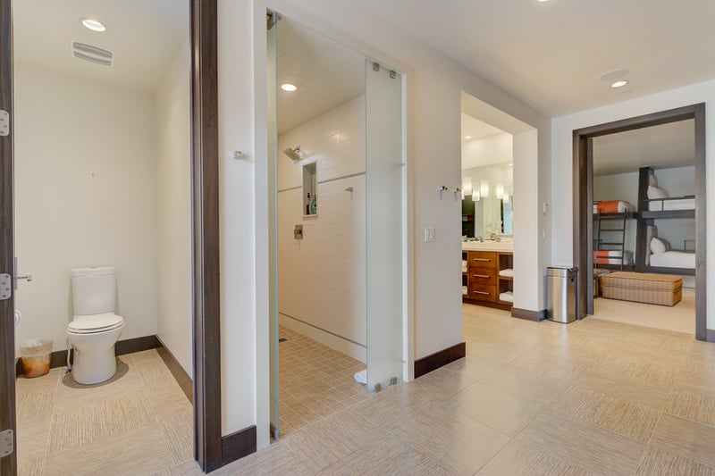 Separate areas allow multiple guests to refresh at once with privacy.