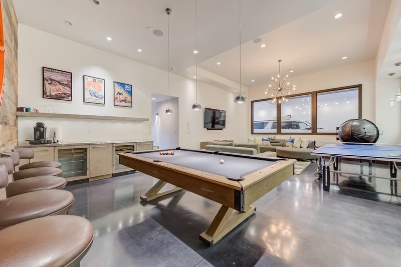 Pool table and bar seating combine fun and function in this recreation zone.