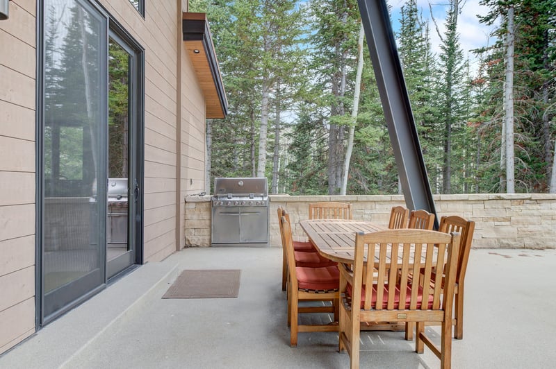 Patio just off the living area is perfect for grilling or lounging outdoors.