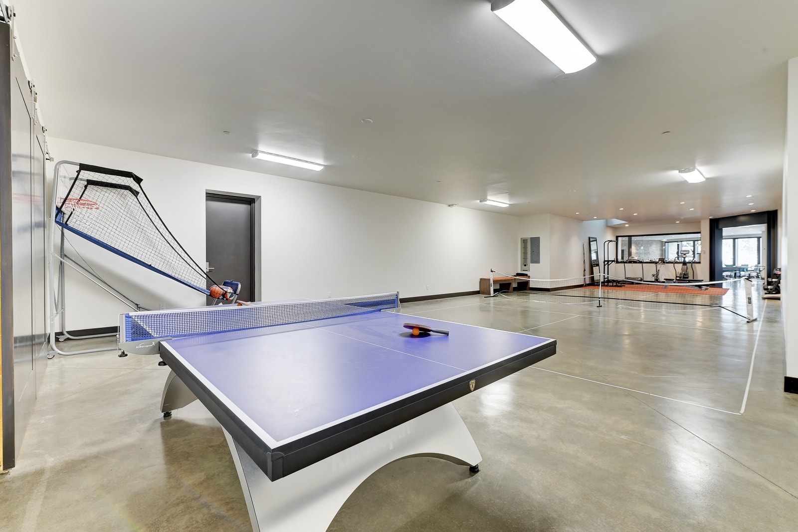Multi-use lower level offers fun for all ages with ping pong and more.