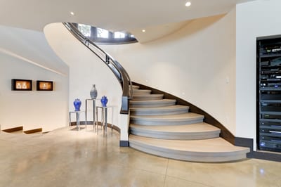 Flowing staircase to the basement. PCO-184M