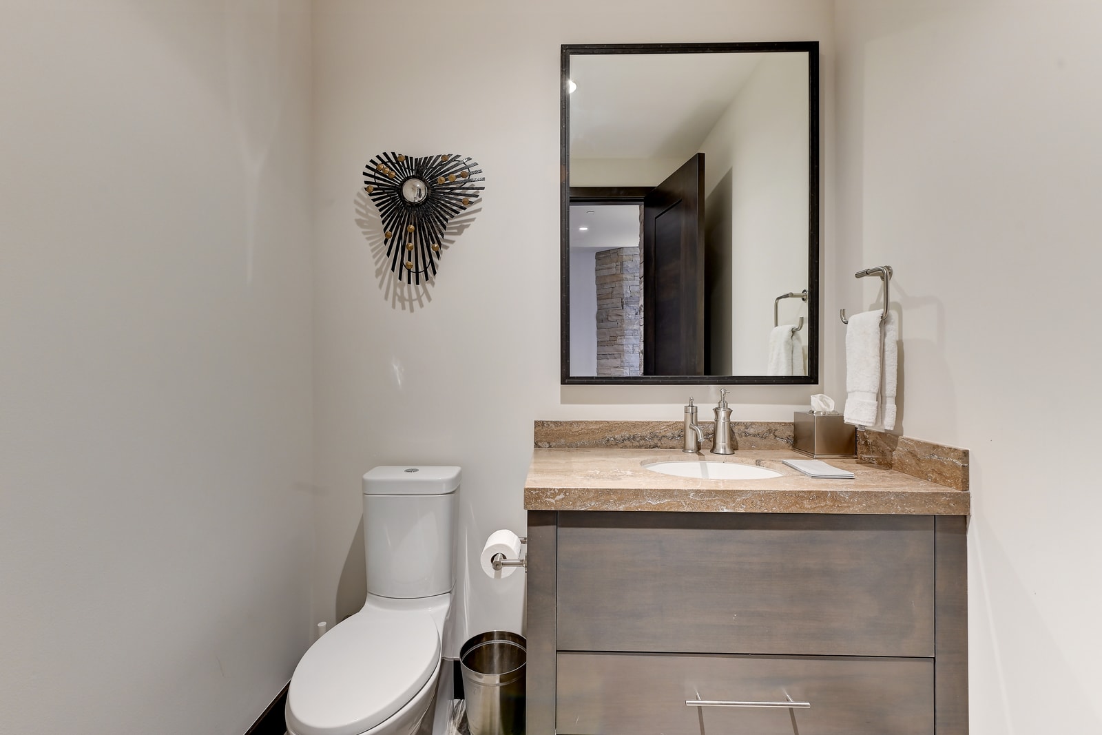 Full bath near the downstairs lounge area keeps things convenient.