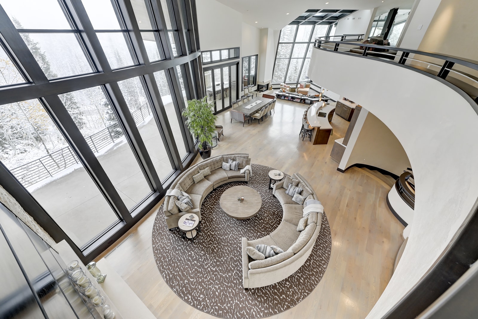 Dramatic overlook reveals the home’s signature curves and custom architecture.