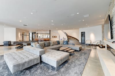 Downstairs family room with huge sectional and bar seating for game nights. PCO-184M