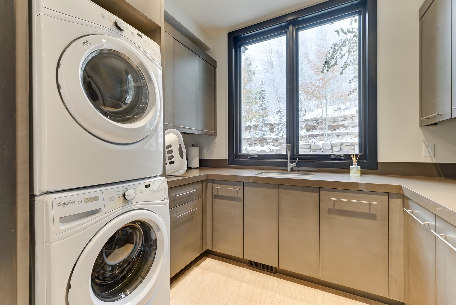In-unit laundry room with ample folding space.