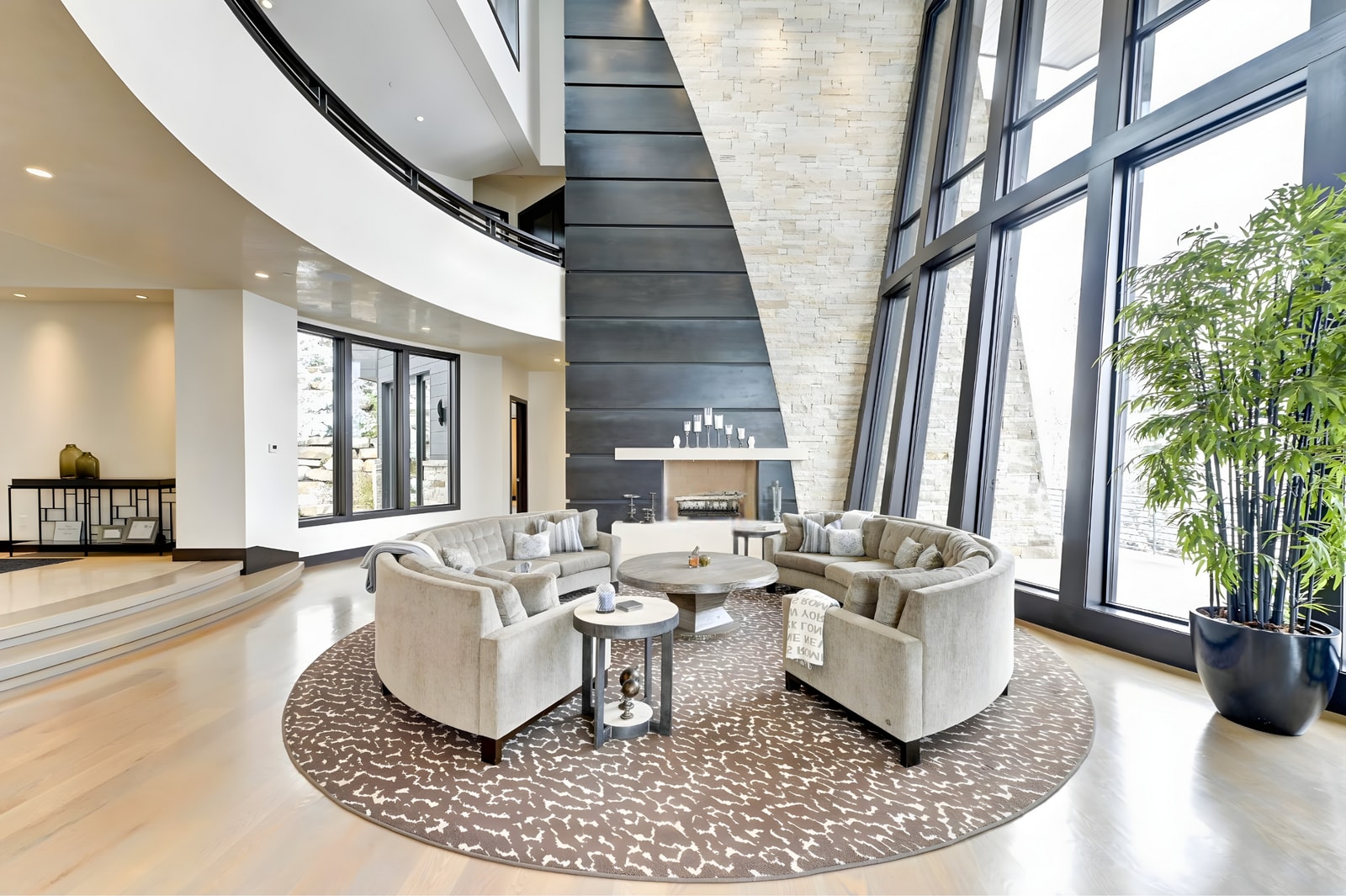 Grand circular seating under soaring ceilings offers a striking yet cozy gathering space.