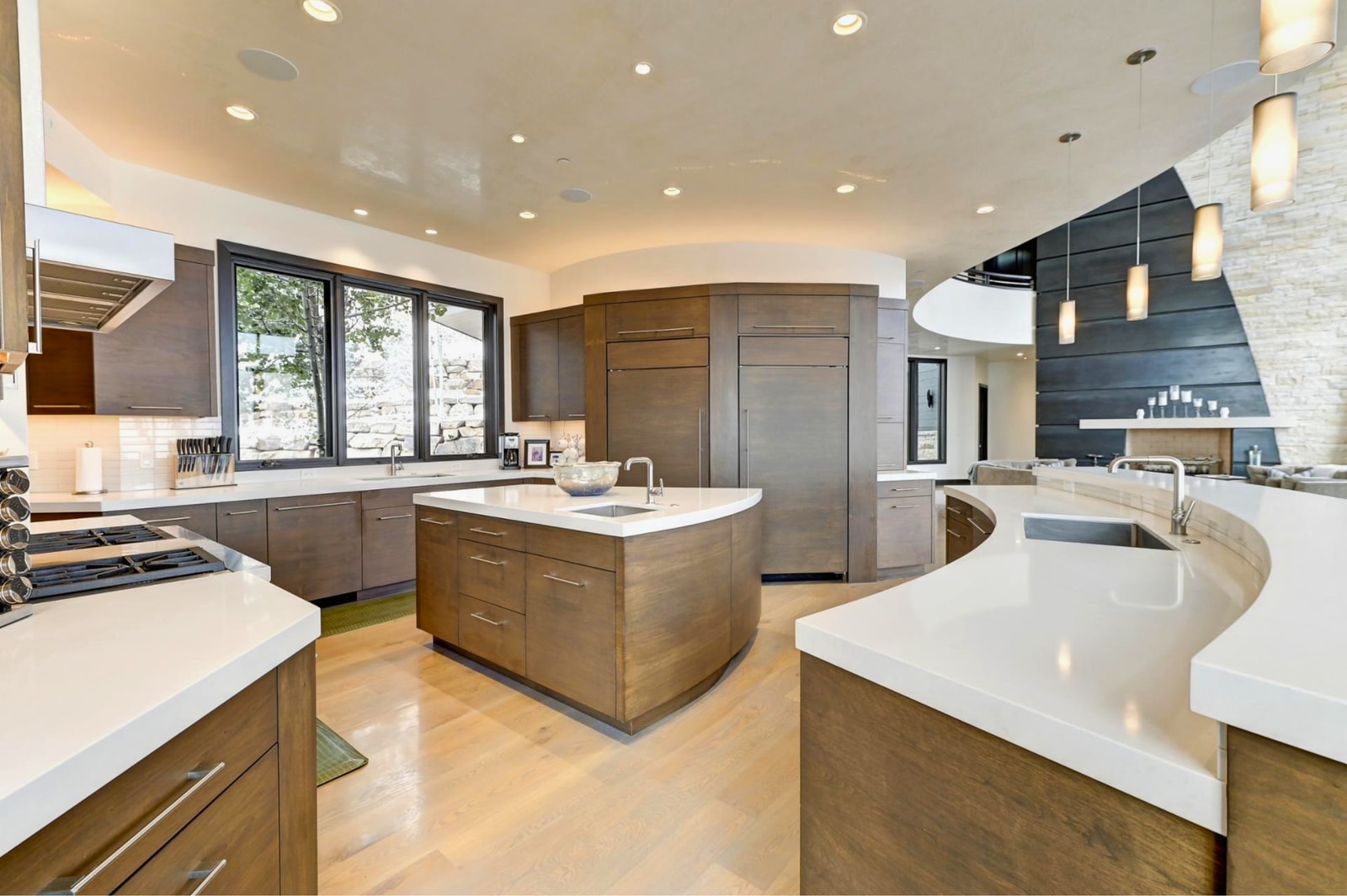 Open-plan prep space connects easily to indoor and outdoor dining areas.