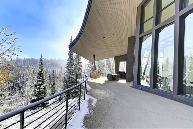 Enjoy unobstructed forest views from the covered balcony, perfect in any season. PCO-184M