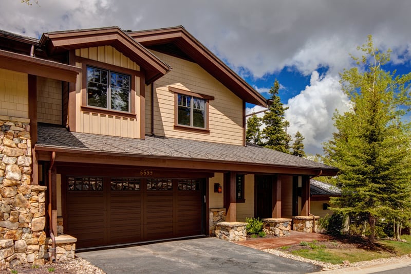 This luxurious alpine home offers a spacious three-story layout with garage and private drive.