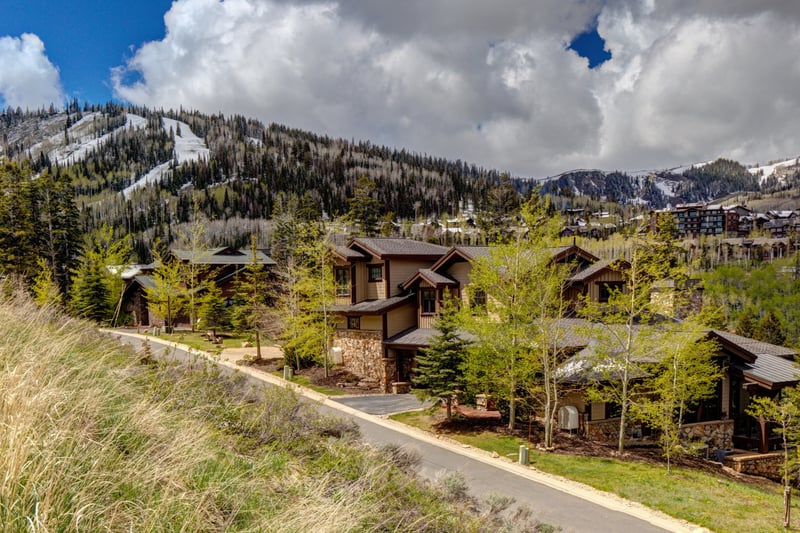 Surrounding trees and trails create privacy while keeping you close to the slopes.